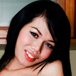 Beautiful ladyboy strips and strokes